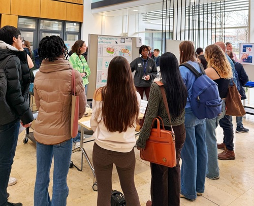 Post-doctoral researcher, Dr Veerle Brans, and doctoral student, Victoria Chris, during their demonstration, “Sound and Microbubbles: A New Way to Treat Bacterial Infections.”
